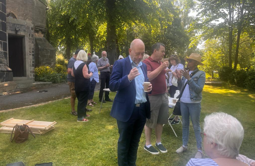 Mark chatting with local volunteers