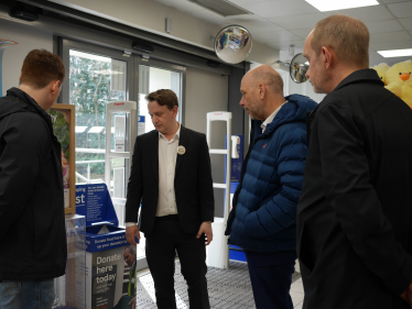 Mark meets staff from FareShare and Tesco